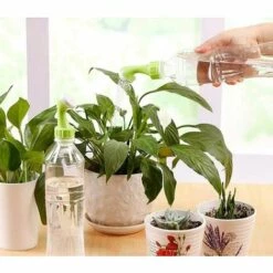 GDRHVFD 4Pcs Srroseur Bouchon De Bouteille, Bouteille Cap D'Arrosage Petit Arroseur Fournitures De Jardinage -Arrosage automatique Soldes 45971027 2